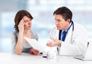 Medical Doctor man and patient woman in hospital